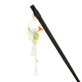 A single hairpin with a circular flower drop