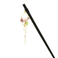 A single hairpin with a circular flower drop