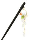 A single hairpin with a circular flower drop